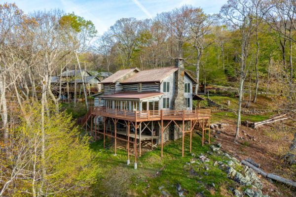 stonebridge cabins for sale, Todd NC log homes, antique log cabins in North Carolina, log homes for sale Todd NC, High Country real estate, homes for sale in Todd NC, Blue Ridge Mountain homes, log cabins near Boone NC, rustic log homes North Carolina, cabins with mountain views for sale, 3 bedroom log home in Todd NC, mountain view homes in Ashe County, authentic log cabin for sale Stonebridge NC, homes near New River Todd NC, real estate in Stonebridge Todd NC, Appalachian style log homes for sale, log cabin with Tesla charger NC, North Carolina mountain homes with land, homes for sale near Boone and West Jefferson, rustic homes in the NC High Country, mountain retreat North Carolina, homes with cathedral ceilings and fireplaces, sunroom with Blue Ridge views, homes with workshop and storage, fenced yard mountain cabin, homes with granite countertops and gas stoves, energy-efficient mountain homes NC, outdoor living homes in the Blue Ridge, pet-friendly mountain cabins, homes with private decks and views, mountain home for sale, mountain houses, todd nc homes for sale, cabins for sale in todd nc