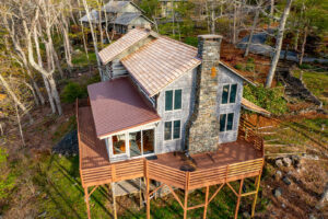 stonebridge log home with views, NC High Country Real Estate, Boone real estate, Blowing Rock real estate, Banner Elk homes for sale, Fleetwood houses for sale, North Carolina mountain homes for sale, Linville, cabins for sale in Beech Mountain, Cabins for sale West Jefferson, NC Land For Sale, Sugar Mountain Homes for sale, banner elk investment property, high country investment properties, blue ridge mountains, long range layered views, mountain views, Stonebridge cabins for sale, Todd NC log homes, antique log cabins in North Carolina, log homes for sale Todd NC, High Country real estate, homes for sale in Todd NC, Blue Ridge Mountain homes, log cabins near Boone NC, rustic log homes North Carolina, cabins with mountain views for sale, 3 bedroom log home in Todd NC, mountain view homes in Ashe County, authentic log cabin for sale Stonebridge NC, homes near New River Todd NC, real estate in Stonebridge Todd NC, Appalachian style log homes for sale, log cabin with Tesla charger NC, North Carolina mountain homes with land, homes for sale near Boone and West Jefferson, rustic homes in the NC High Country, mountain retreat North Carolina, homes with cathedral ceilings and fireplaces, sunroom with Blue Ridge views, homes with workshop and storage, fenced yard mountain cabin, homes with granite countertops and gas stoves, energy-efficient mountain homes NC, outdoor living homes in the Blue Ridge, pet-friendly mountain cabins, homes with private decks and views